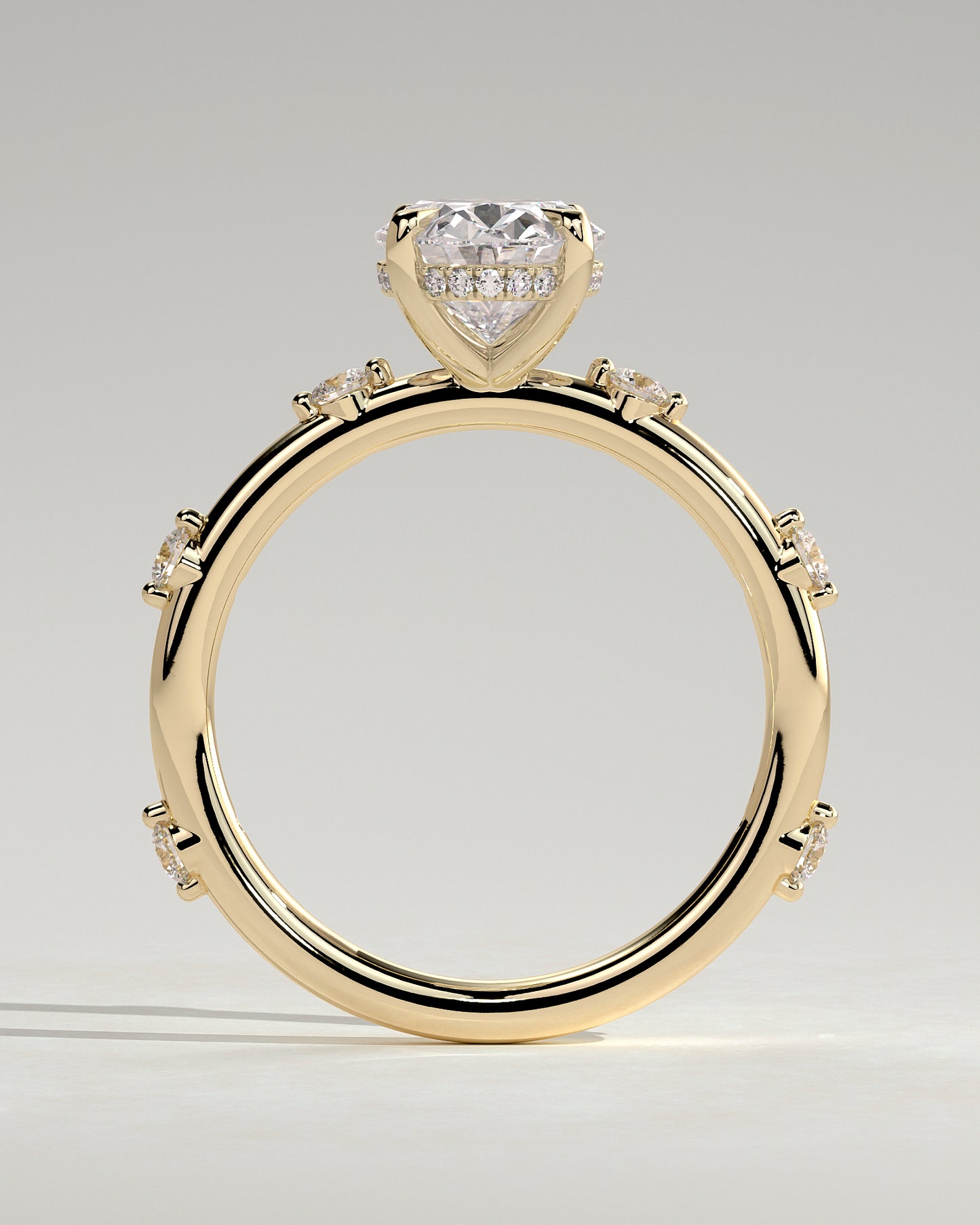 Elise - Oval Claw Solitaire with 6 Spaced Round Accent Stones and Hidden Halo Engagement Ring - Yellow Gold - Yellow Gold 2ct