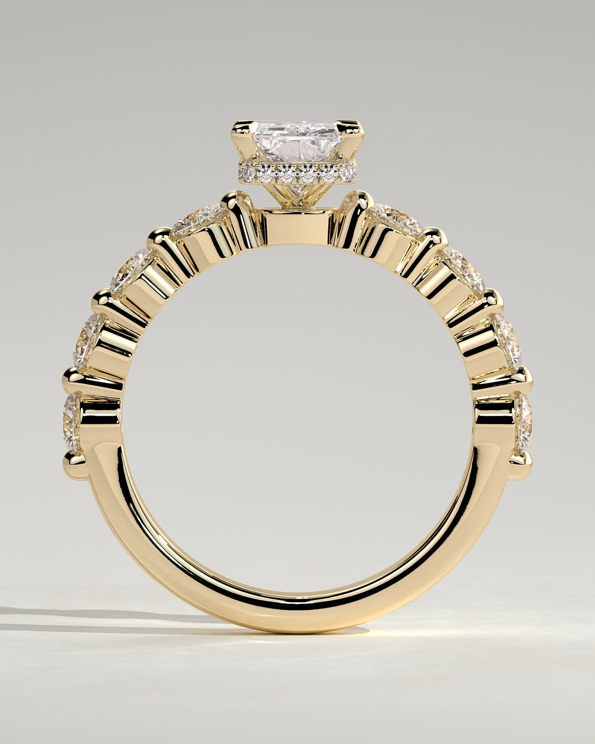 Josephine - Radiant Claw Solitaire with Round Accent Stones and Wrap Around Hidden Halo Engagement Ring - Yellow Gold