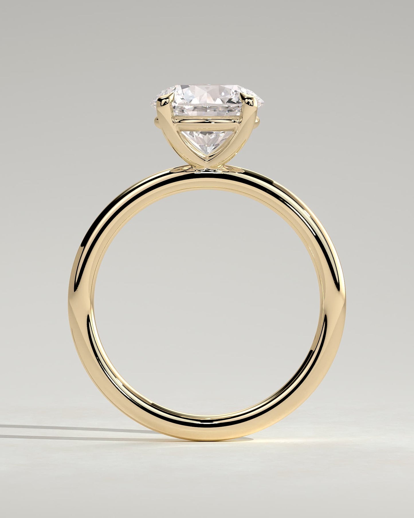 Lilly - Round Claw Solitaire Engagement Ring - Yellow Gold