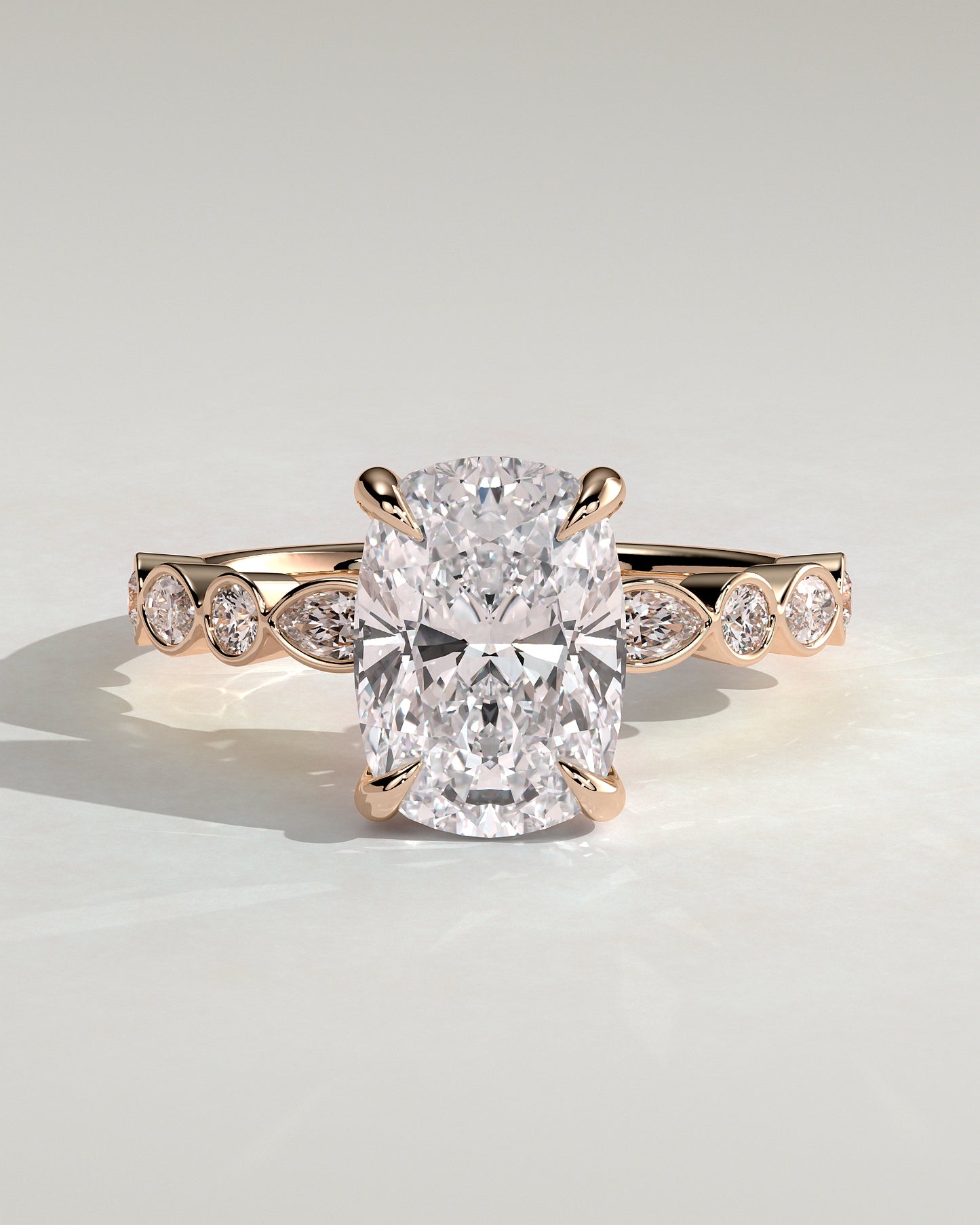 Carrie - Elongated Cushion Claw Solitaire with Round-Marquise Bezel Accent Stones Engagement Ring - Rose Gold