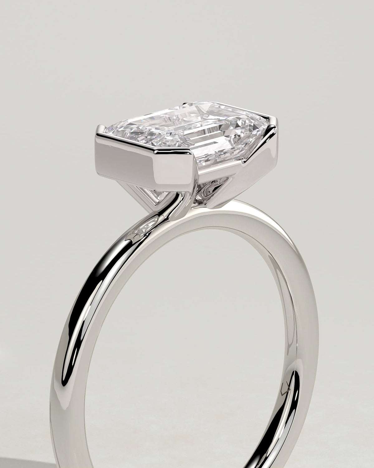 Jodie - Emerald East West Half Bezel Solitaire Engagement Ring - Platinum