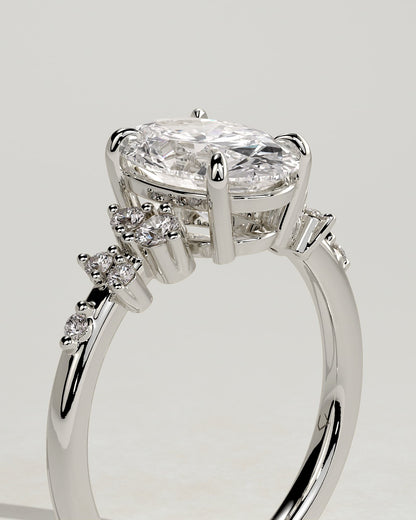 Bella - Oval Claw Solitaire with Clustered Round Shoulder Stones Engagement Ring - Platinum