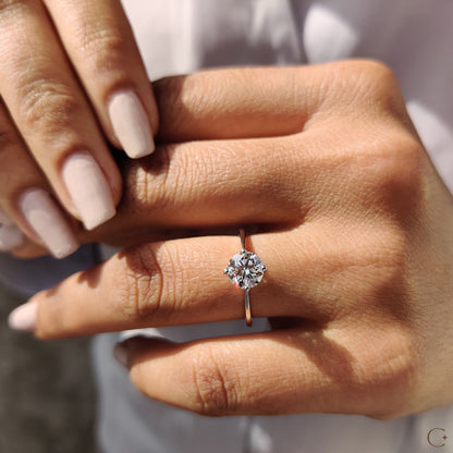 Round Solitaire Engagement Ring With Tapered Shank Design