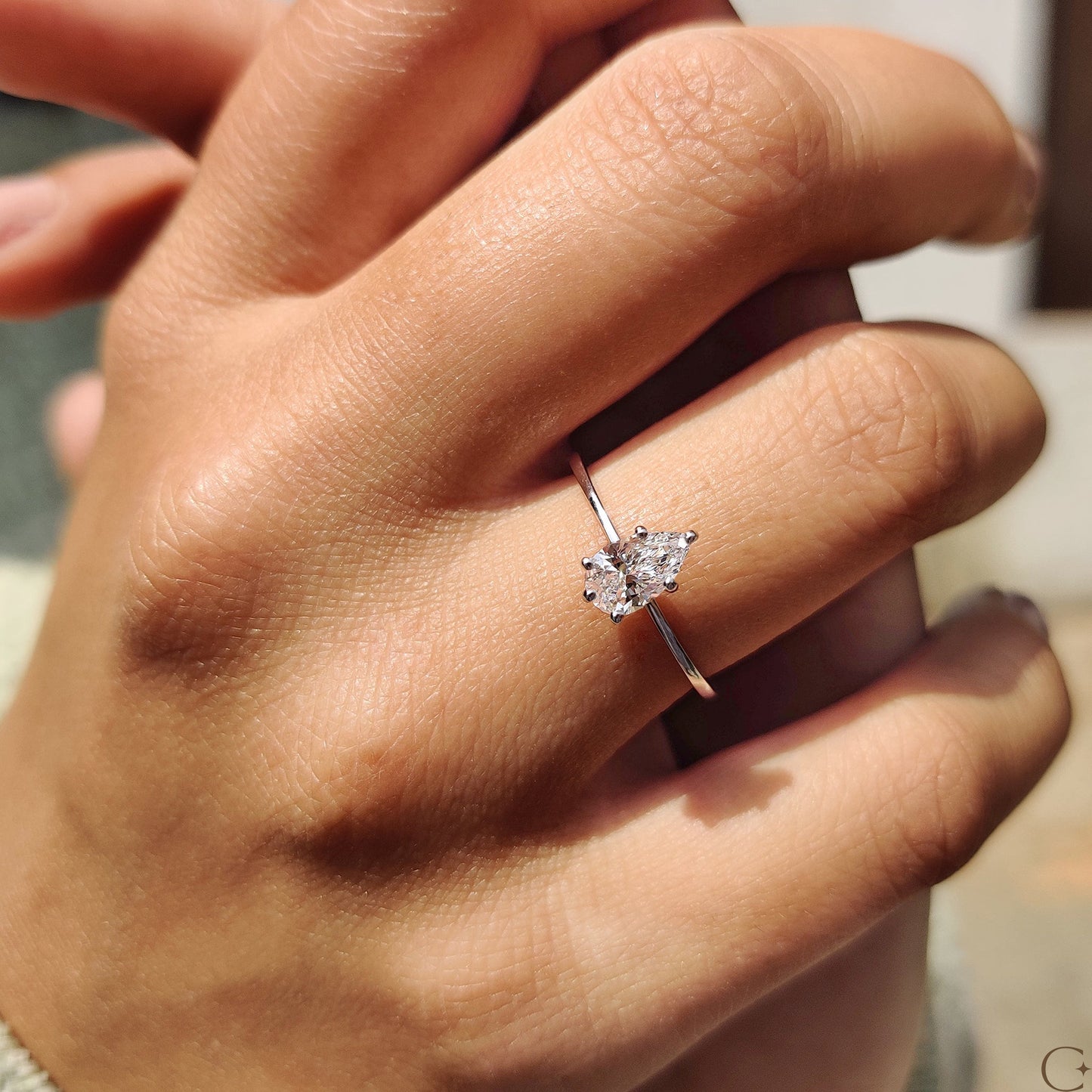 Pear Shaped Diamond Ring In Solitaire Style