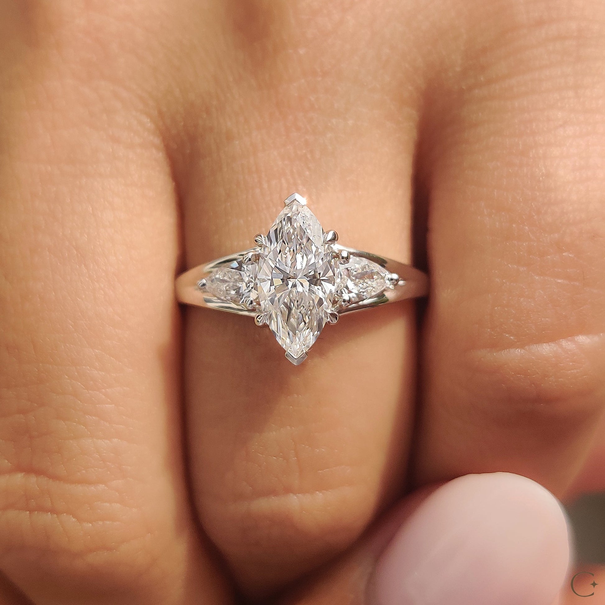 Marquise And Pear Diamond Ring