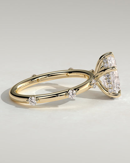 Amora - Pear Claw Solitaire with 6 Spaced Round Accent Stones and Hidden Halo Engagement Ring - Yellow Gold