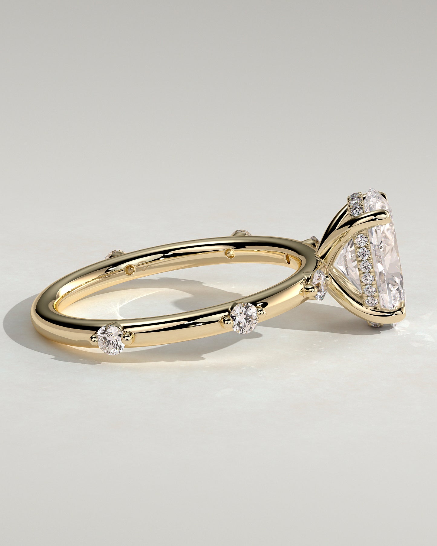 Elise - Oval Claw Solitaire with 6 Spaced Round Accent Stones and Hidden Halo Engagement Ring - Yellow Gold - Yellow Gold 2ct