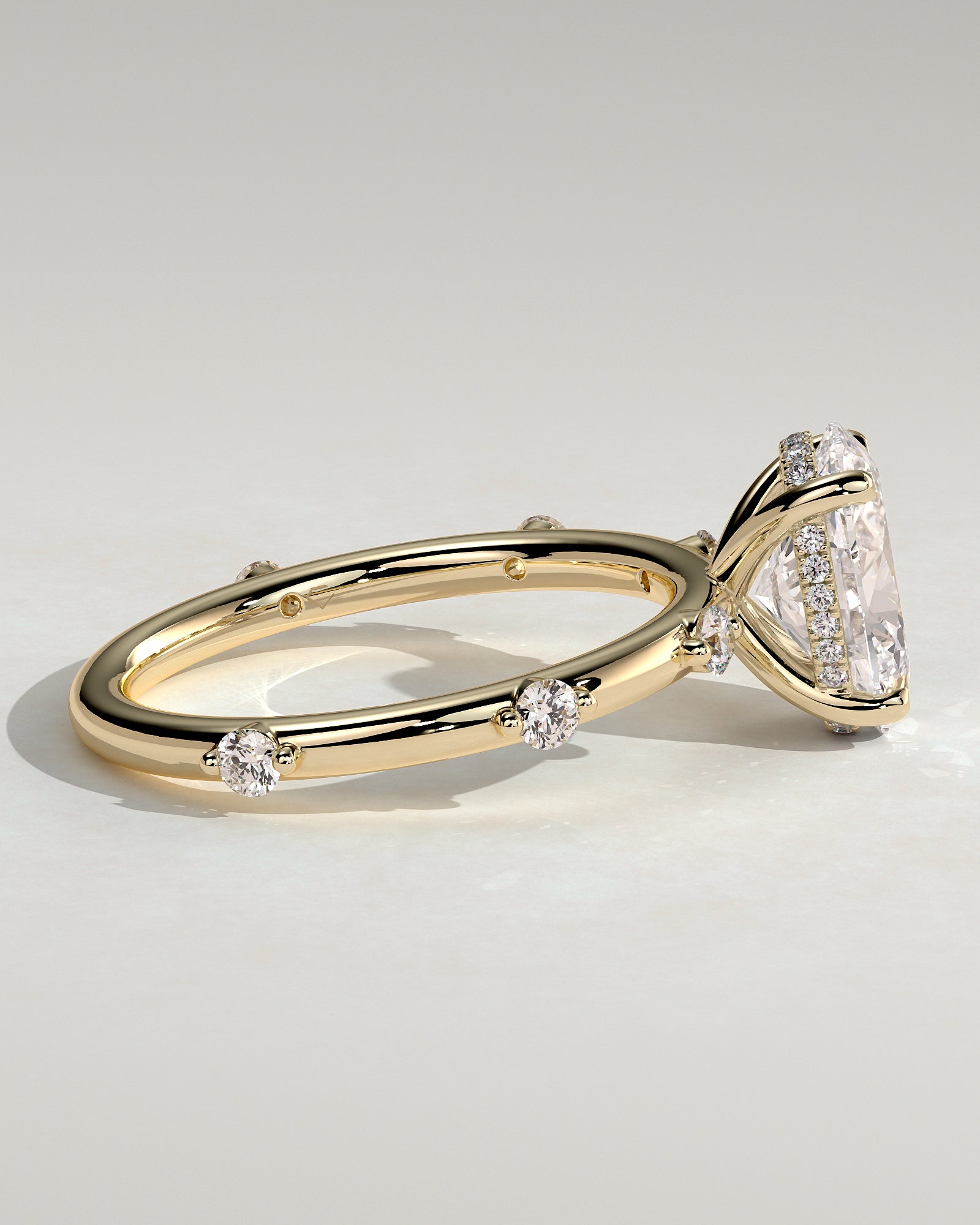 Elise - Oval Claw Solitaire with 6 Spaced Round Accent Stones and Hidden Halo Engagement Ring - Yellow Gold - Yellow Gold 2ct