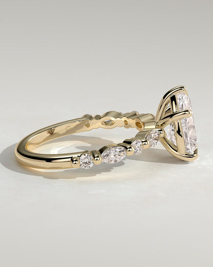Jacinta - Pear Claw Solitaire with Marquise and Round Accent Stones Engagement Ring - Yellow Gold