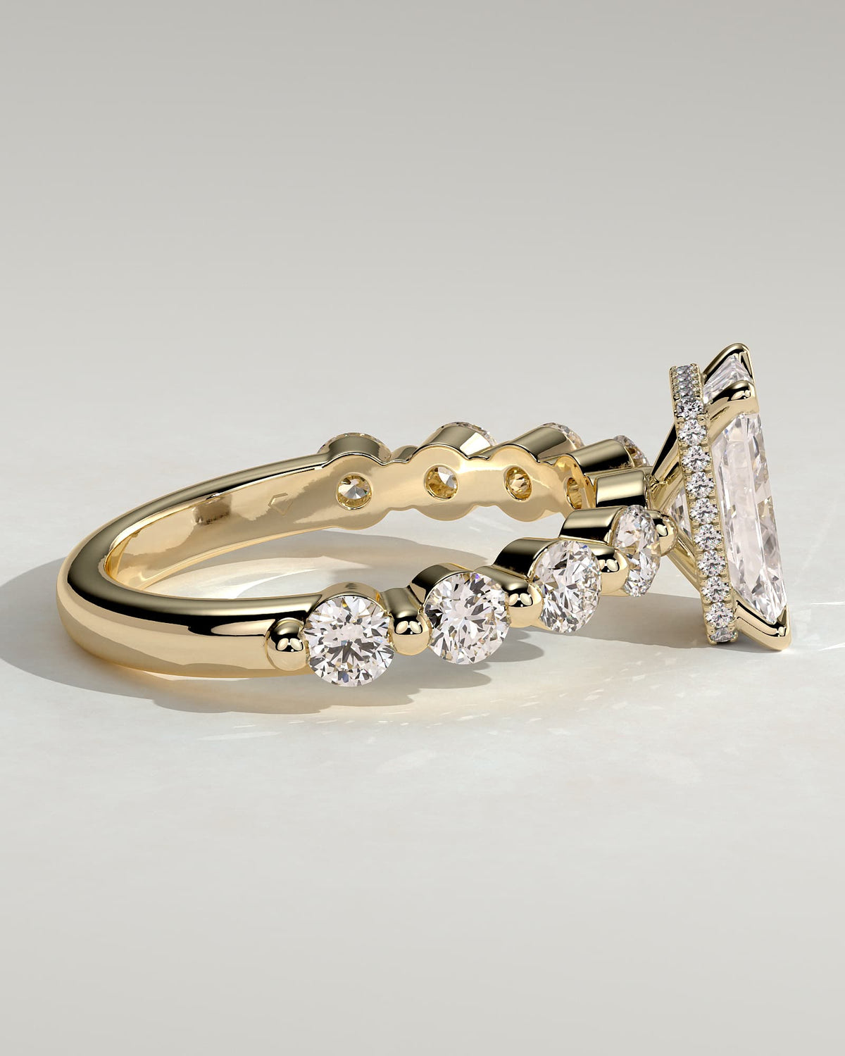 Josephine - Radiant Claw Solitaire with Round Accent Stones and Wrap Around Hidden Halo Engagement Ring - Yellow Gold