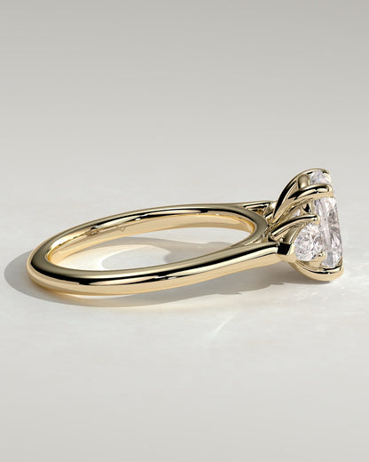 Cataleya - Elongated Cushion Claw Trilogy with Pear Side Stones and Cathedral Setting Engagement Ring - Yellow Gold