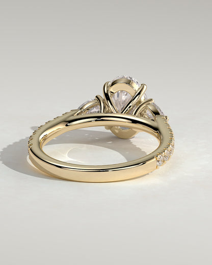 Arabella - Oval Claw Trilogy with Pear Side Stones and Pave Band Engagement Ring - Yellow Gold