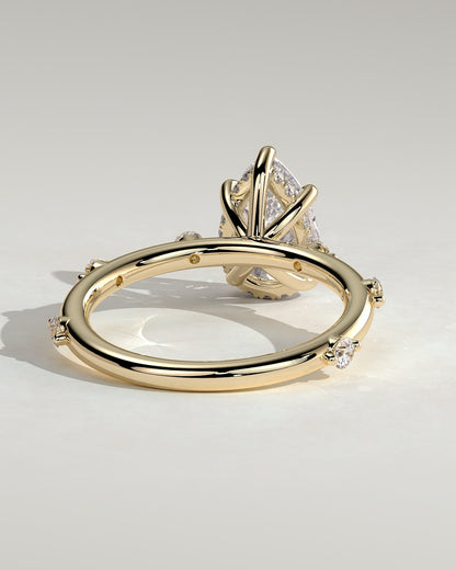Amora - Pear Claw Solitaire with 6 Spaced Round Accent Stones and Hidden Halo Engagement Ring - Yellow Gold