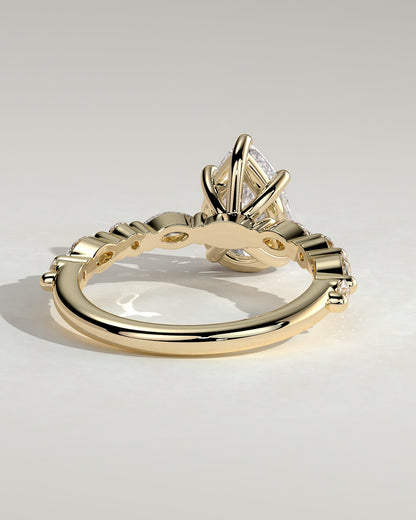 Jacinta - Pear Claw Solitaire with Marquise and Round Accent Stones Engagement Ring - Yellow Gold