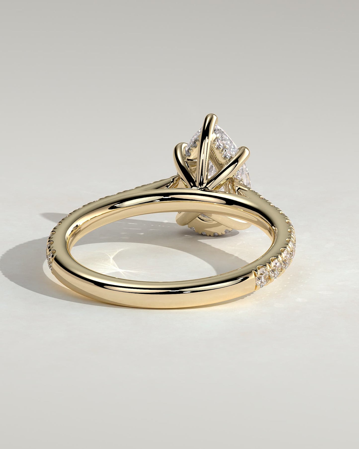 Katrina - Pear Claw Solitaire with Hidden Halo, Pave Band and Cathedral High Setting Engagement Ring - Yellow Gold