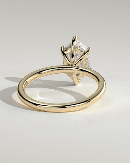 Delta - Elongated Hexagon Claw Solitaire with Hidden Halo Engagement Ring - Yellow Gold