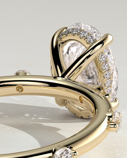 Elise - Oval Claw Solitaire with 6 Spaced Round Accent Stones and Hidden Halo Engagement Ring - Yellow Gold