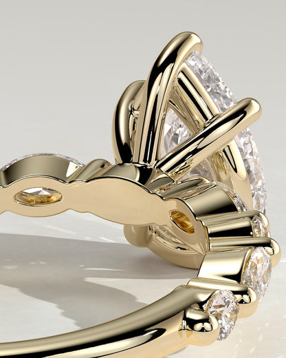 Jacinta - Pear Claw Solitaire with Marquise and Round Accent Stones Engagement Ring - Yellow Gold