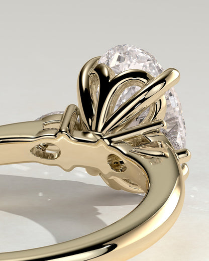 Elena - Oval Claw Trilogy with Pear Side Stones and Tulip Detail Engagement Ring - Yellow Gold