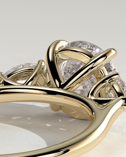 Arya - Round Claw Trilogy with Pear Side Stones and Cathedral Setting Engagement Ring - Yellow Gold
