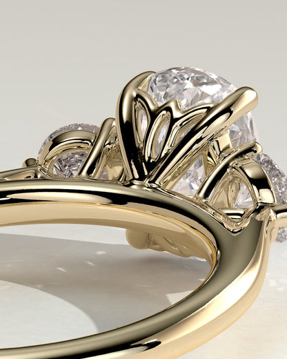Charmaine - Elongated Cushion Claw Trilogy with Round Side Stones and Lily Detail Engagement Ring - Yellow Gold