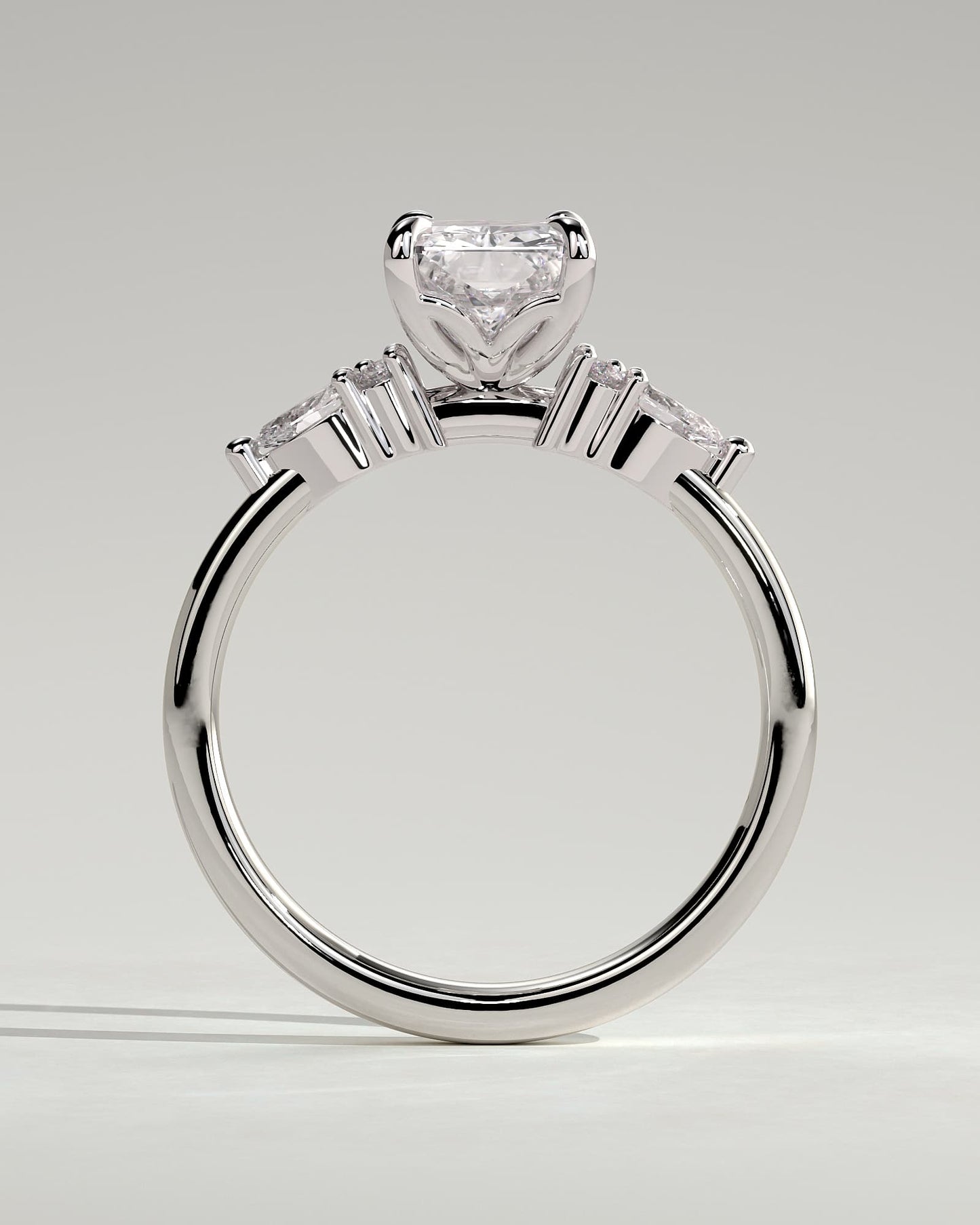Heidi - Radiant Claw Solitaire with Pear Accents and Round Shoulder Stones Engagement Ring - White Gold