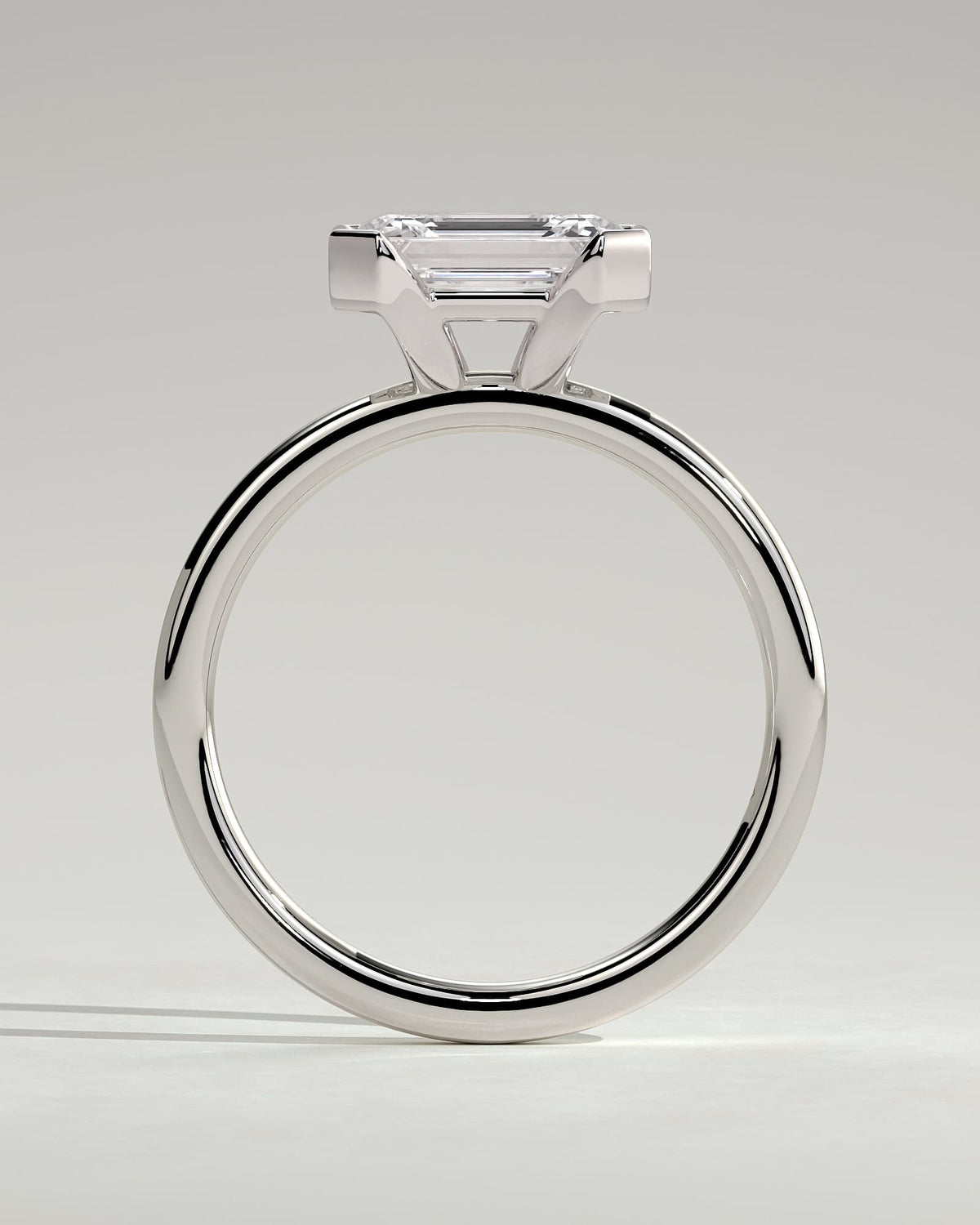 Jodie - Emerald East West Half Bezel Solitaire Engagement Ring - White Gold