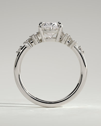 Bella - Oval Claw Solitaire with Clustered Round Shoulder Stones Engagement Ring - Platinum