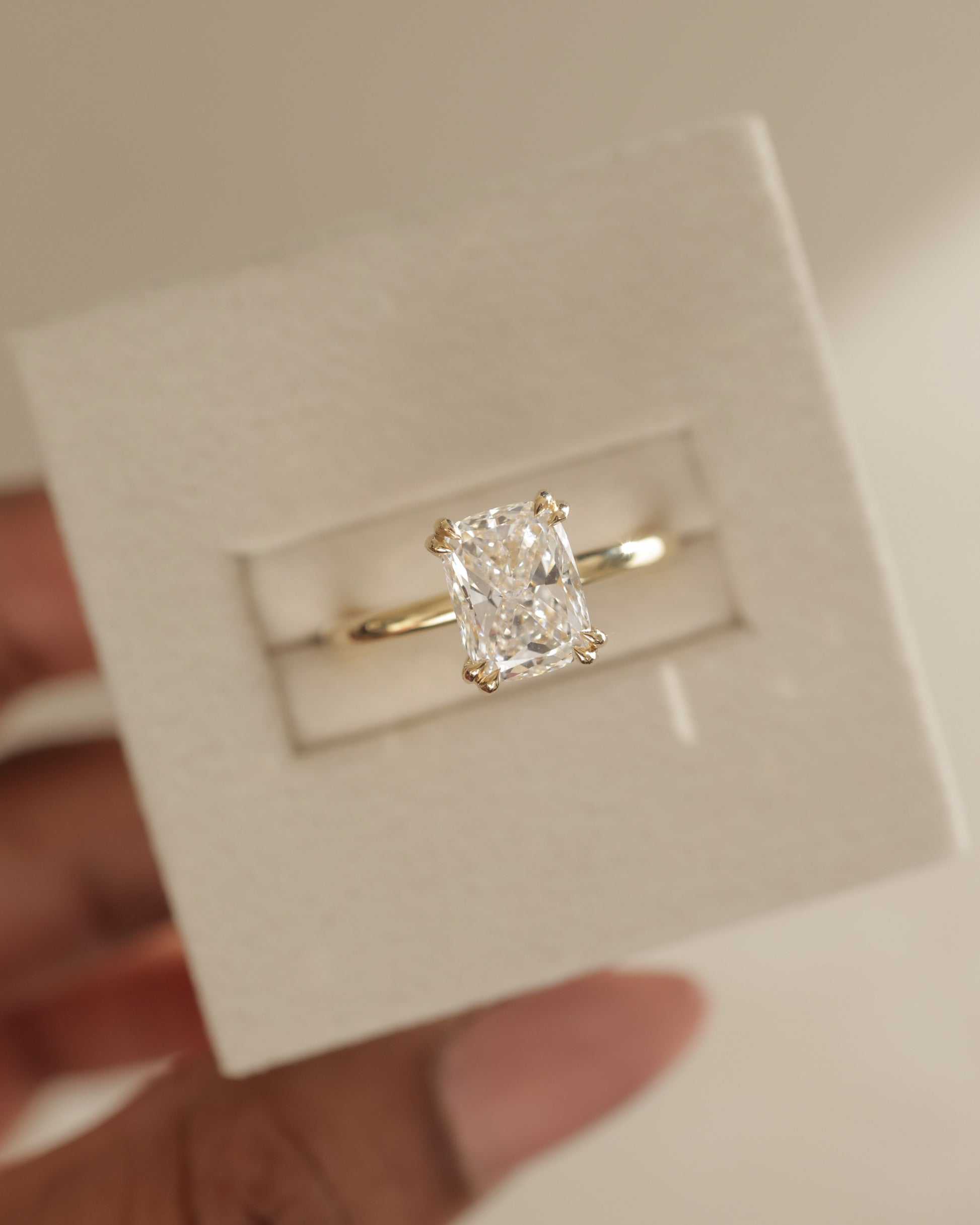 Aubrey - Elongated Cushion Double Claw Solitaire with Hidden Halo Engagement Ring - Rose Two-Tone - Lifestyle