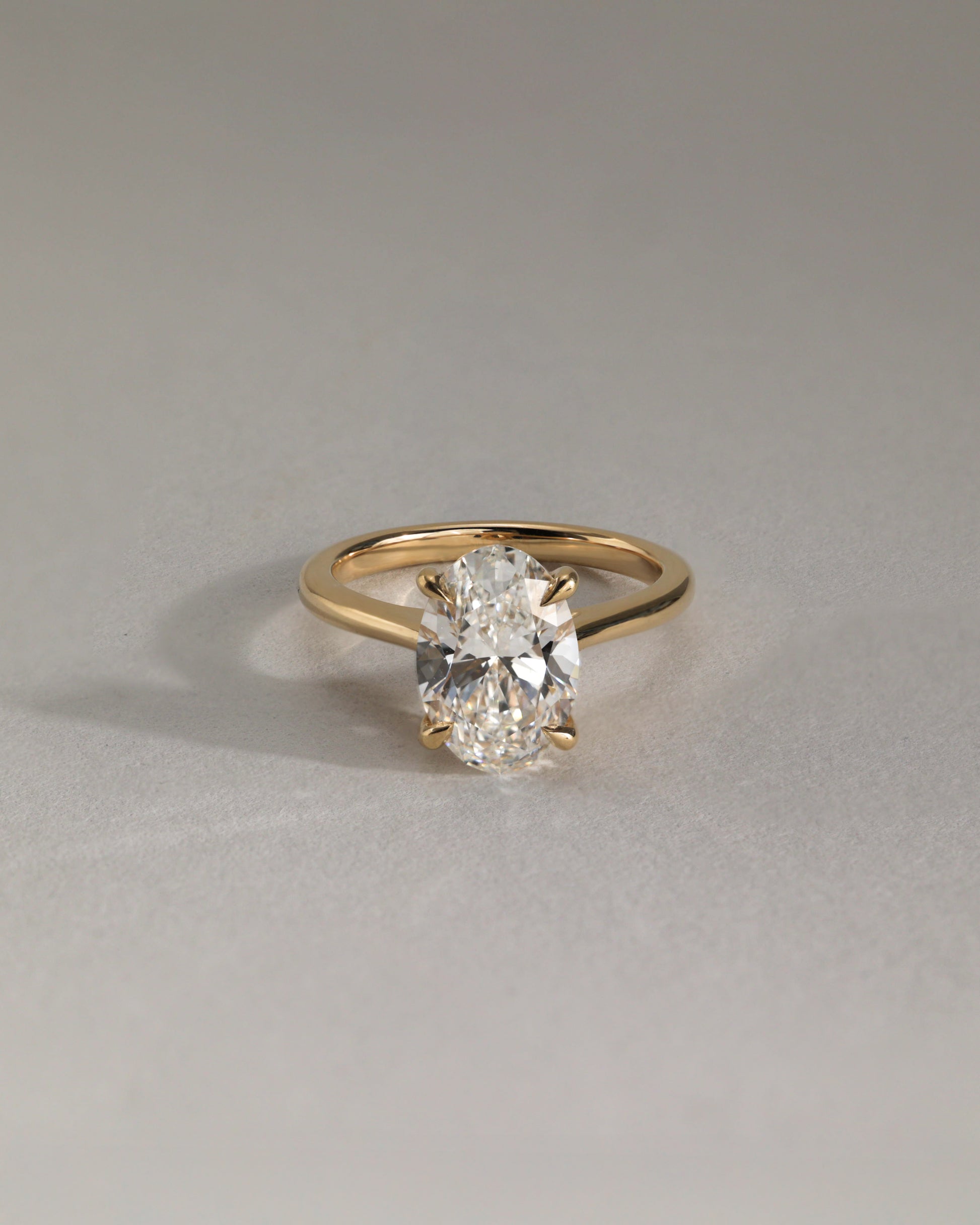 Bethany - Oval Claw Solitaire with Hidden Halo, Tapered Band and Cathedral High Setting Engagement Ring - Rose Two-Tone - Lifestyle