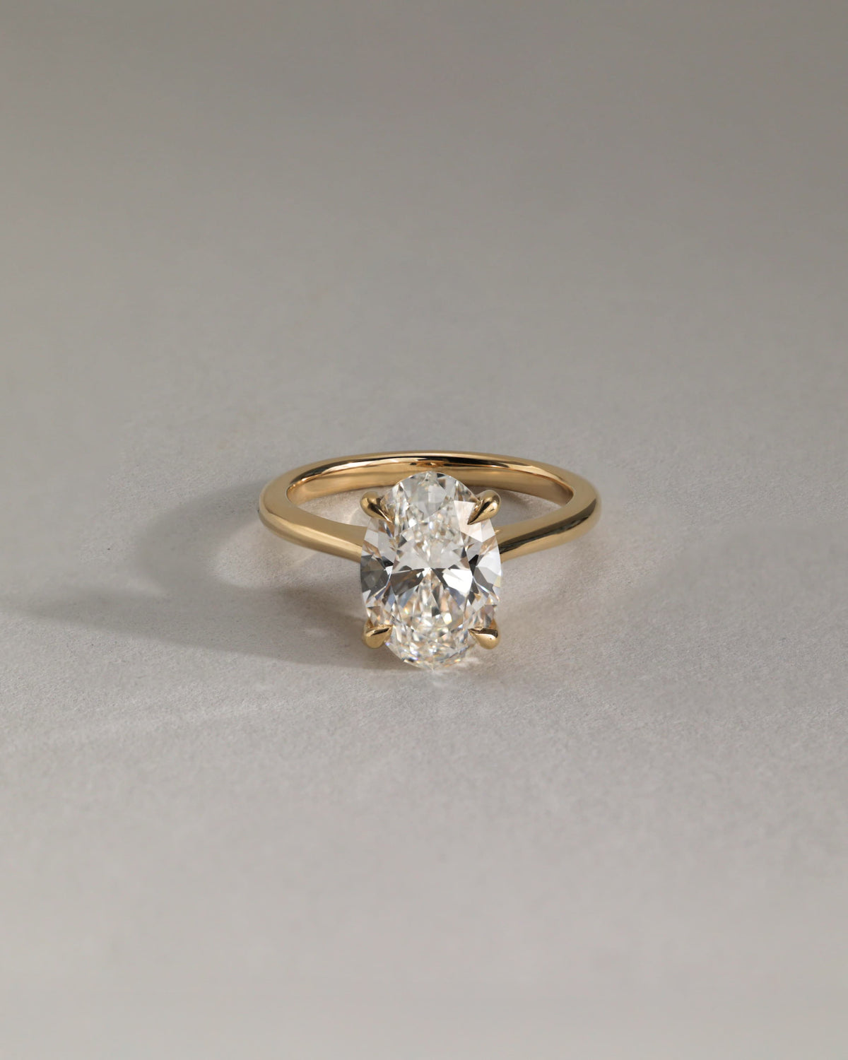 Bethany - Oval Claw Solitaire with Hidden Halo, Tapered Band and Cathedral High Setting Engagement Ring - Yellow Two-Tone