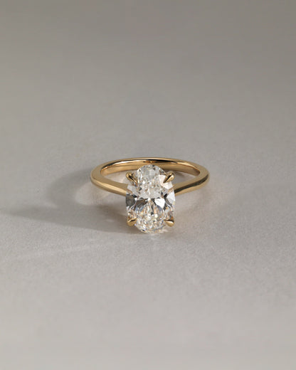 Bethany - Oval Claw Solitaire with Hidden Halo, Tapered Band and Cathedral High Setting Engagement Ring - Yellow Gold