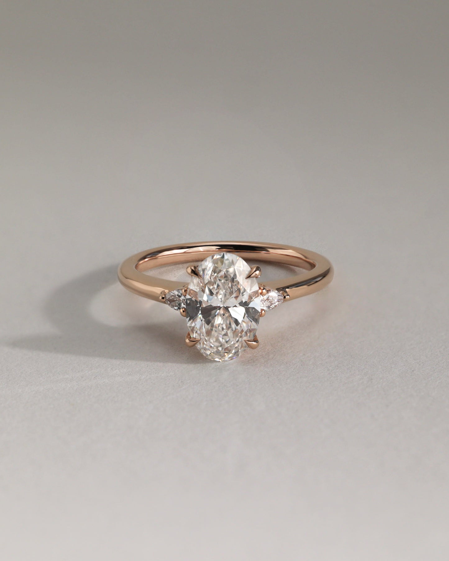 Elena - Oval Claw Trilogy with Pear Side Stones and Tulip Detail Engagement Ring - Rose Two-Tone - Lifestyle