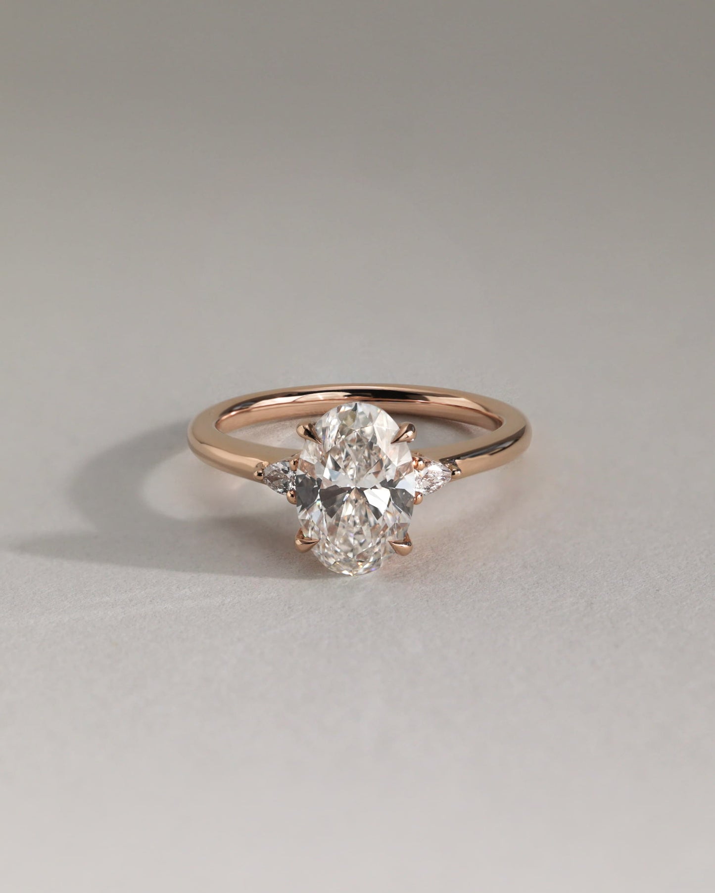 Elena - Oval Claw Trilogy with Pear Side Stones and Tulip Detail Engagement Ring - White Gold