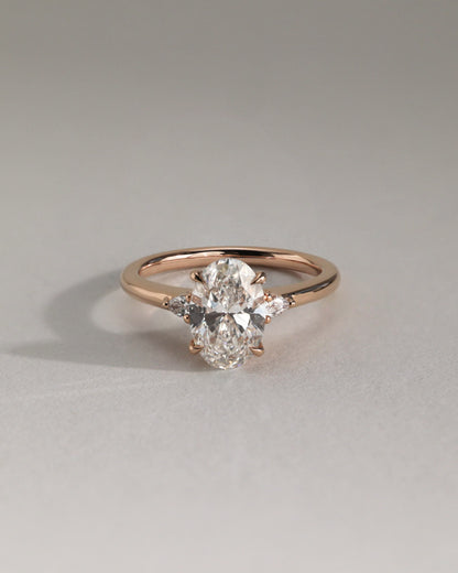 Elena - Oval Claw Trilogy with Pear Side Stones and Tulip Detail Engagement Ring - Yellow Gold