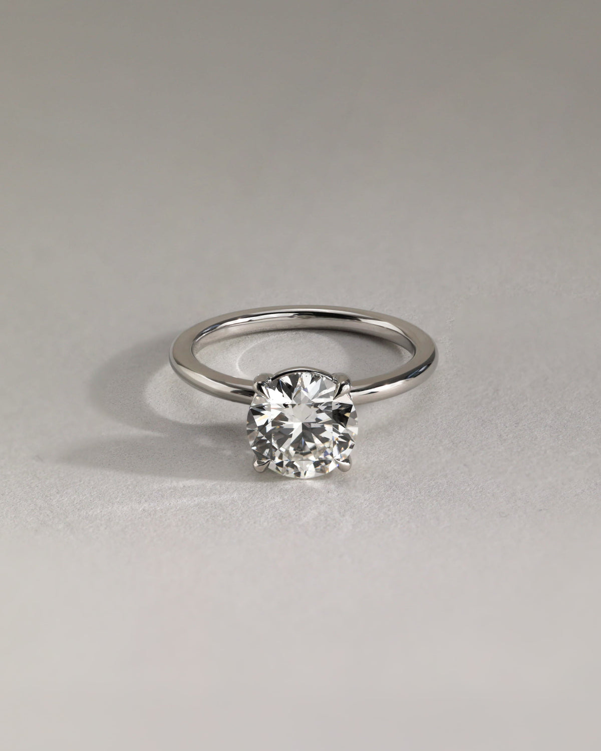 Lilly - Round Claw Solitaire Engagement Ring - Platinum