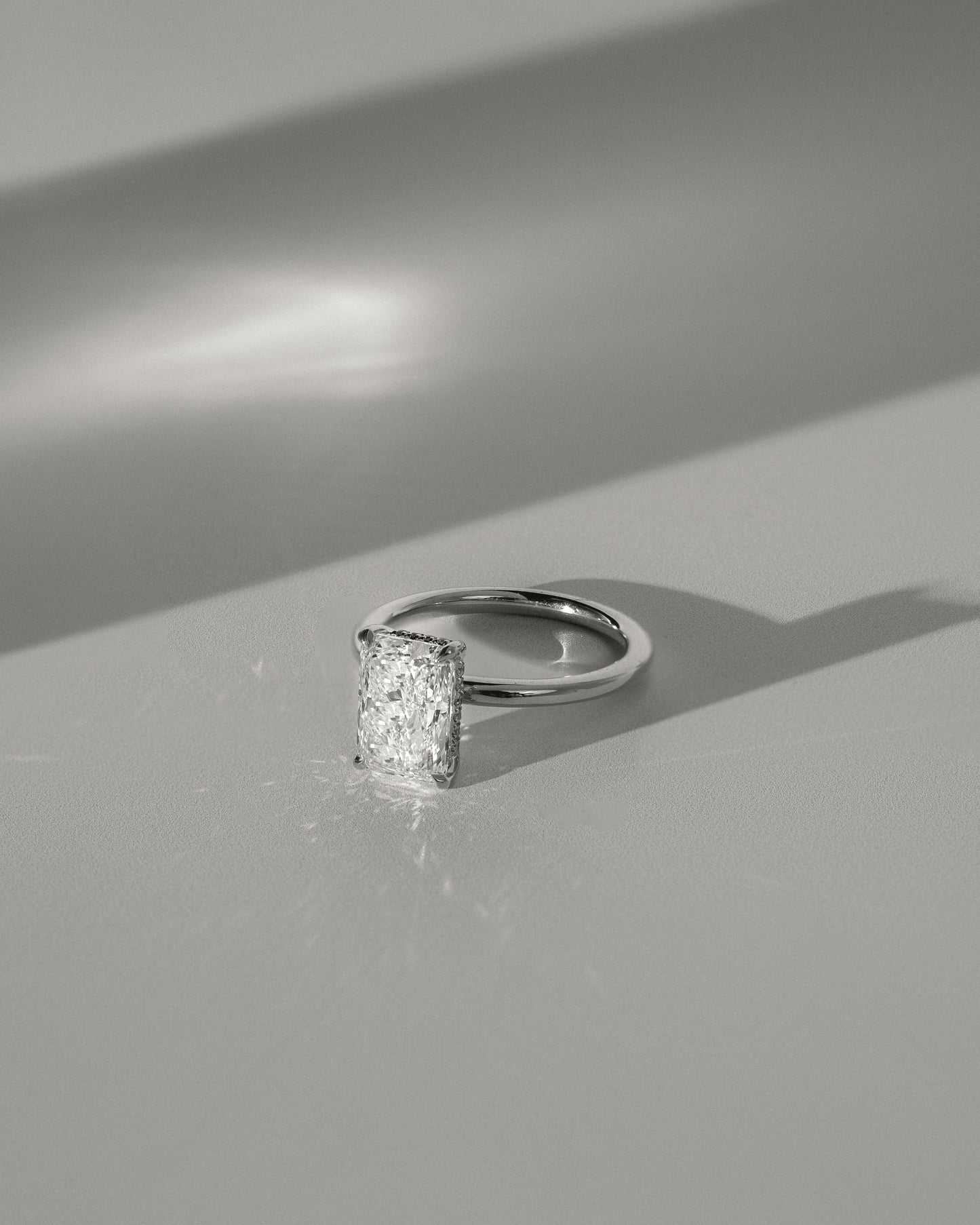 Carly - Radiant Claw Solitaire with Hidden Halo Engagement Ring - Rose Two-Tone - Lifestyle