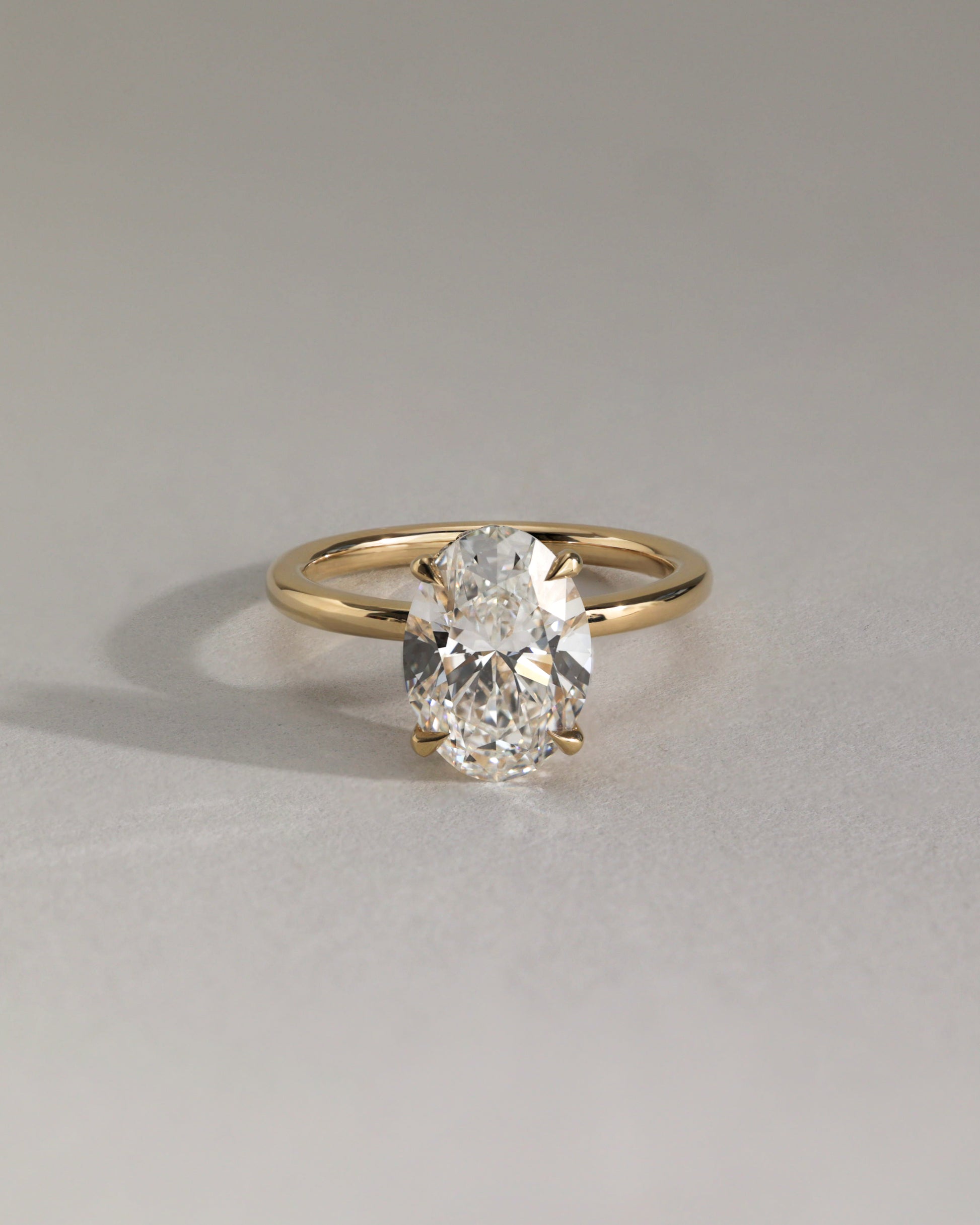 Cecilia - Oval Claw Solitaire with Wrap Around Hidden Halo Engagement Ring - Rose Two-Tone - Lifestyle