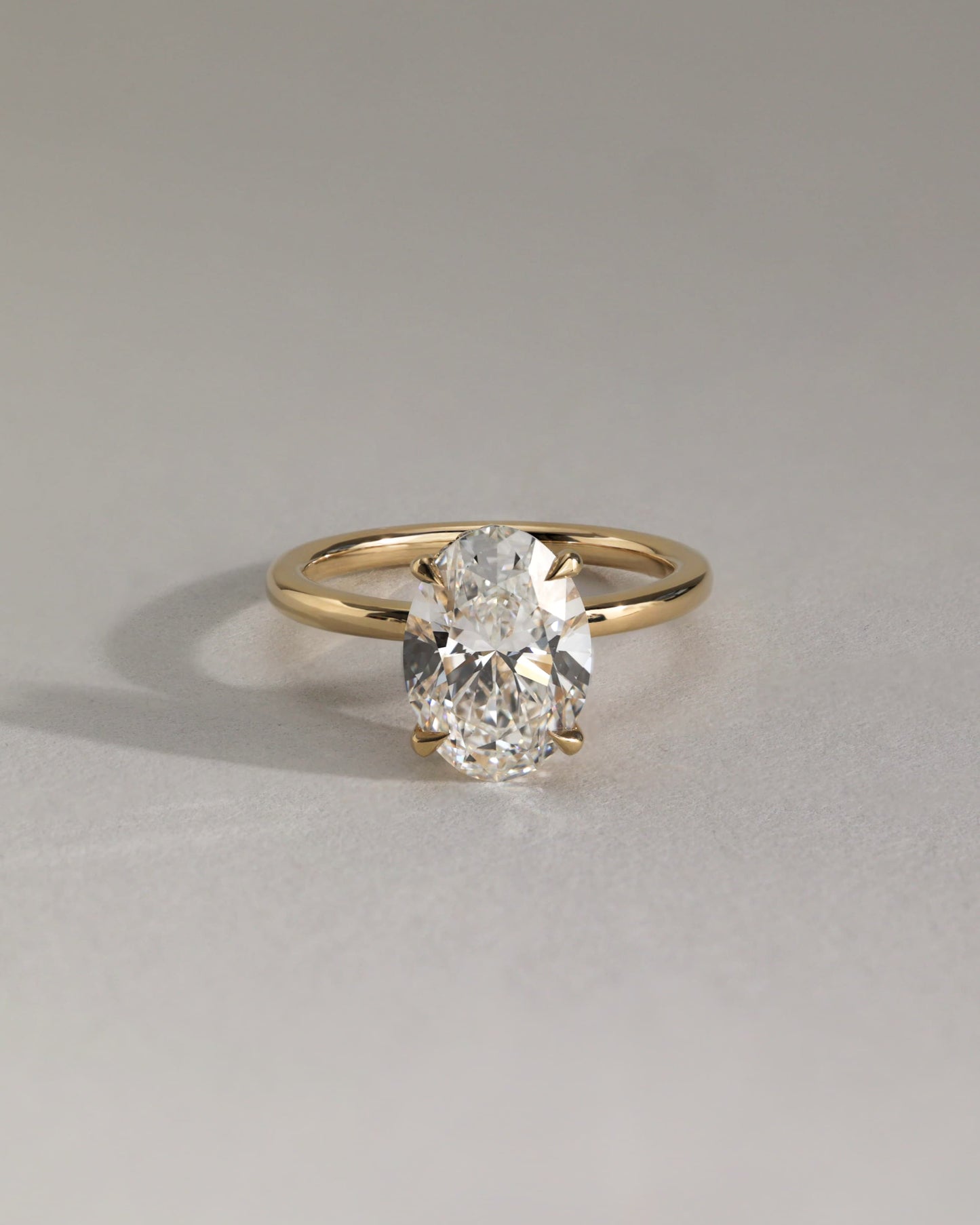 Cecilia - Oval Claw Solitaire with Wrap Around Hidden Halo Engagement Ring - Yellow Two-Tone