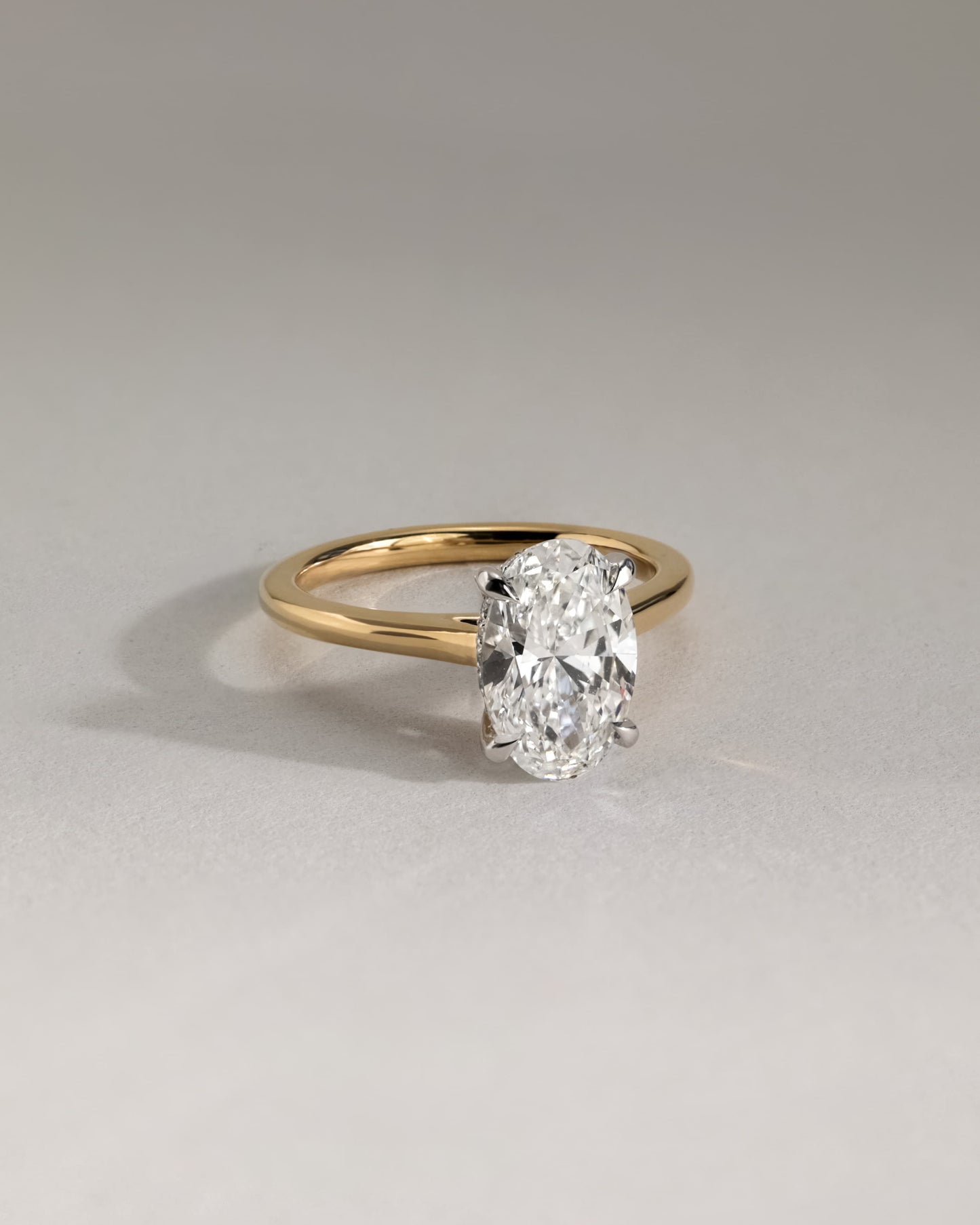 Scarlett - Oval Claw Solitaire with Hidden Halo and Cathedral High Setting Engagement Ring - Platinum