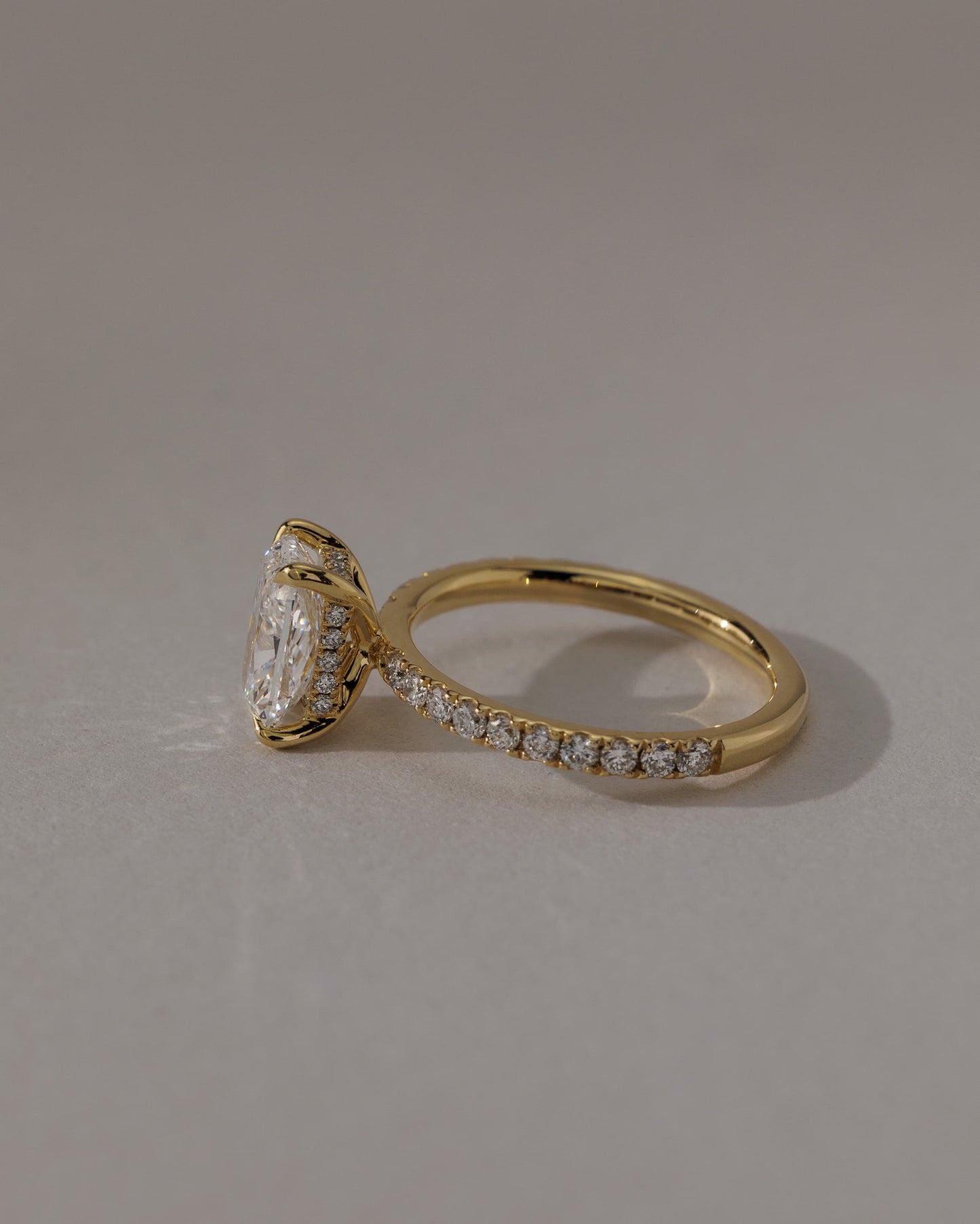 Camilla - Elongated Cushion Claw Solitaire with Hidden Halo and Pave Band Engagement Ring - Yellow Gold