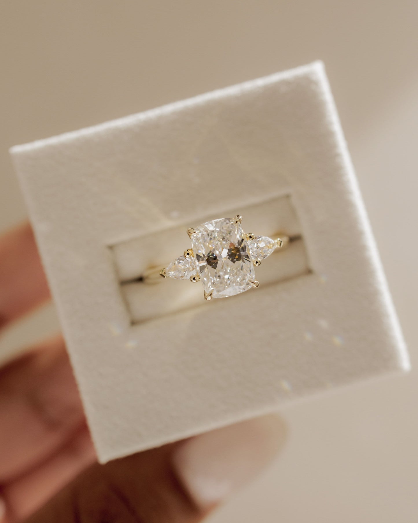 Cataleya - Elongated Cushion Claw Trilogy with Pear Side Stones and Cathedral Setting Engagement Ring - Yellow Gold