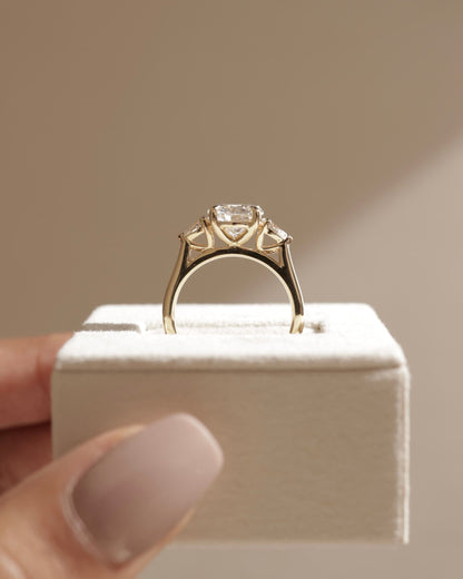 Arya - Round Claw Trilogy with Pear Side Stones and Cathedral Setting Engagement Ring - Platinum