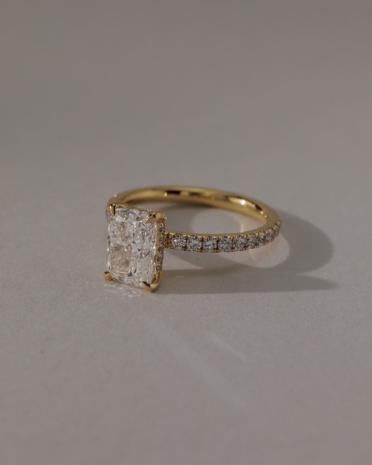 Camilla - Elongated Cushion Claw Solitaire with Hidden Halo and Pave Band Engagement Ring - Yellow Gold