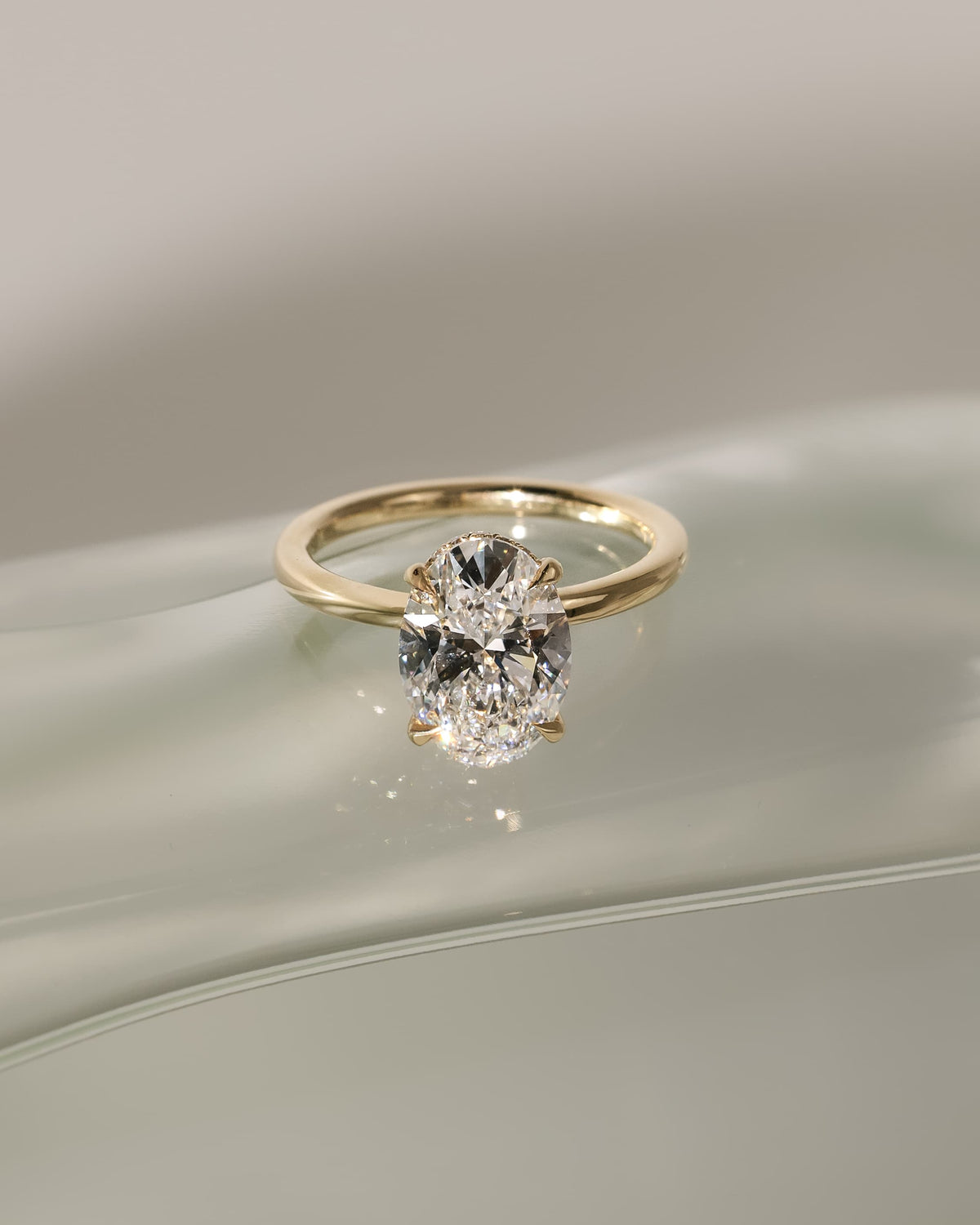 Cecilia - Oval Claw Solitaire with Wrap Around Hidden Halo Engagement Ring - Yellow Two-Tone