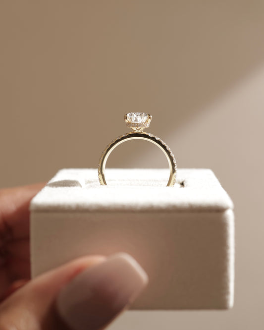 Keira - Pear Claw Solitaire with Wrap Around Hidden Halo and Pave Band Engagement Ring - Yellow Gold - Lifestyle