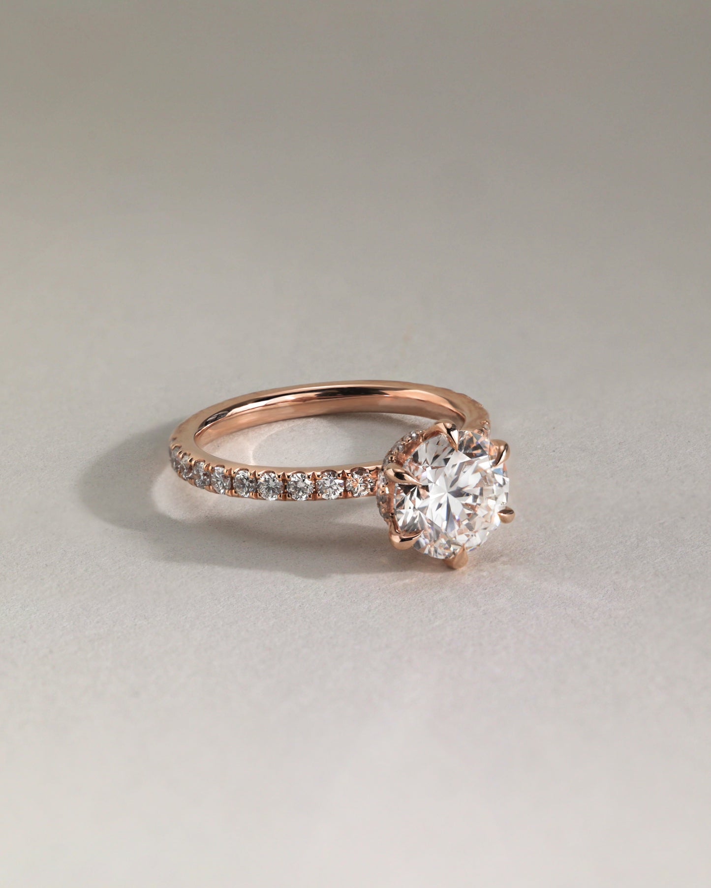 Amanda - Round Claw Solitaire with Wrap Around Hidden Halo and Pave Band Engagement Ring - Rose Two-Tone - Lifestyle