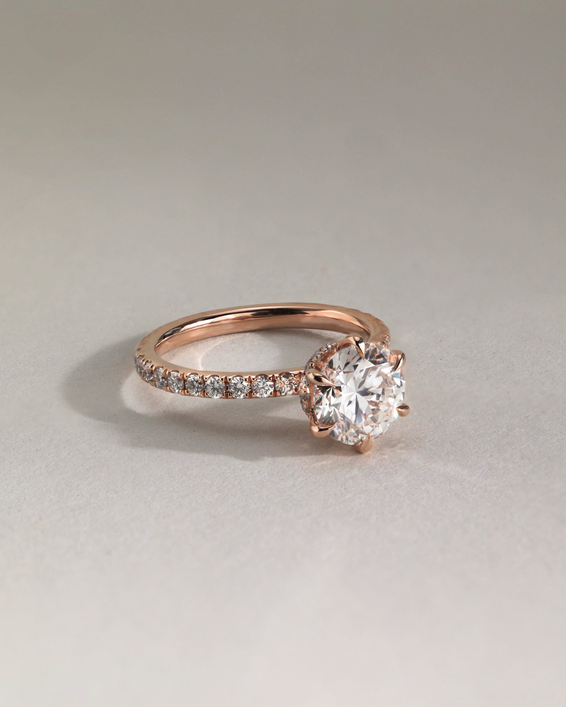 Amanda - Round Claw Solitaire with Wrap Around Hidden Halo and Pave Band Engagement Ring - Rose Two-Tone - Lifestyle