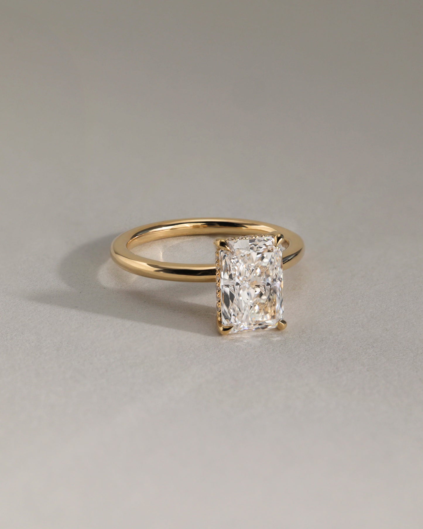 Carly - Radiant Claw Solitaire with Hidden Halo Engagement Ring - Rose Two-Tone - Lifestyle