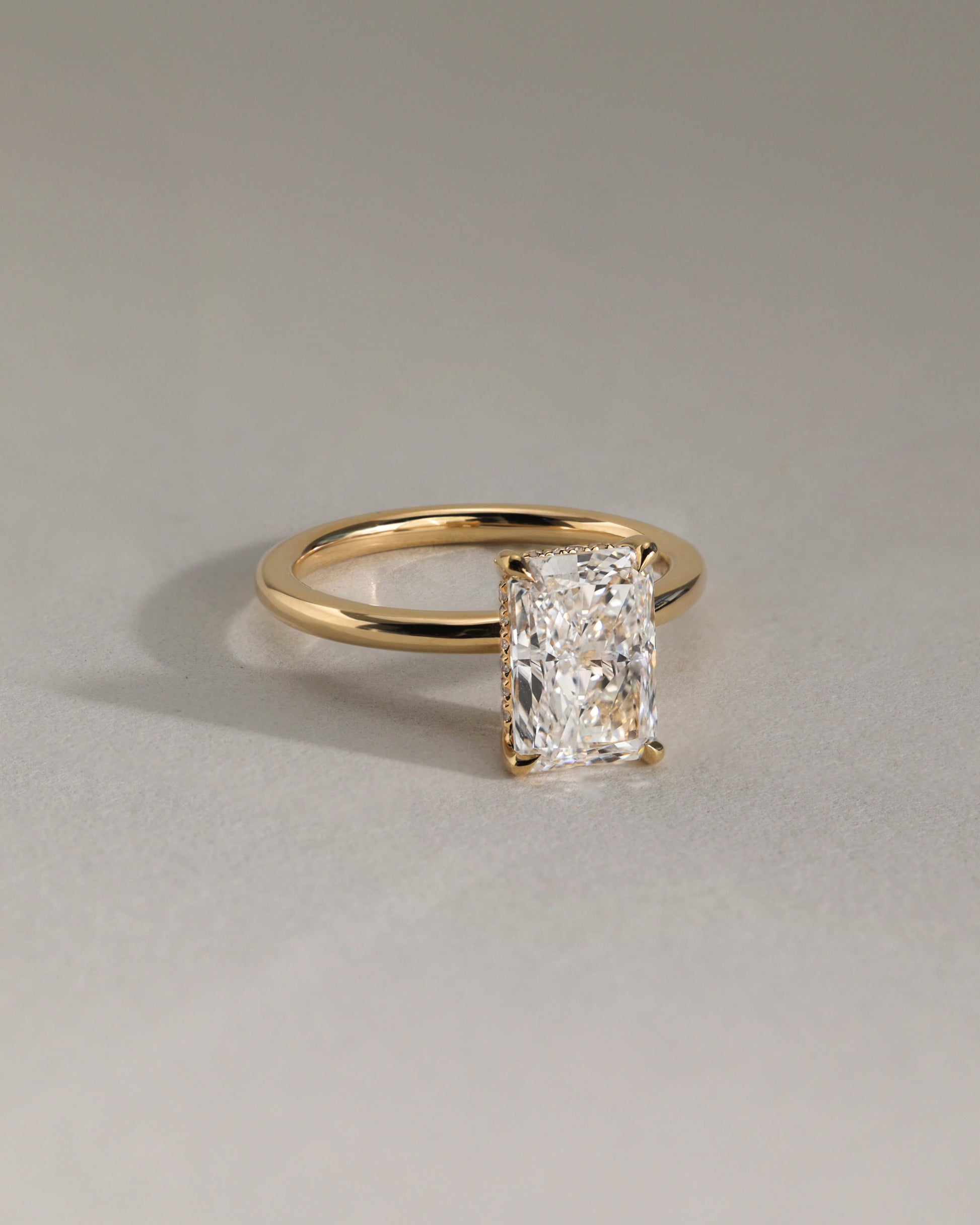 Carly - Radiant Claw Solitaire with Hidden Halo Engagement Ring - Rose Two-Tone - Lifestyle
